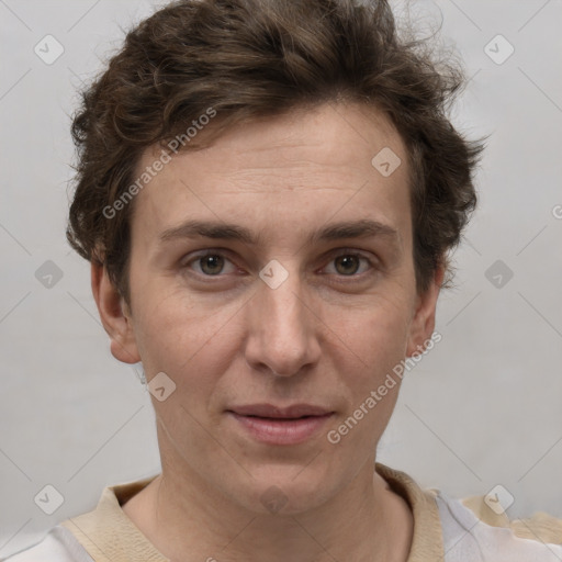 Joyful white adult female with short  brown hair and grey eyes