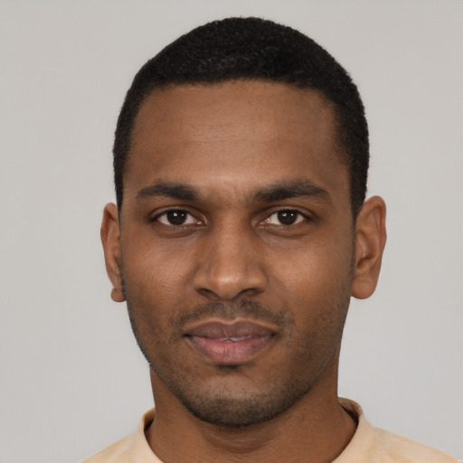 Neutral black young-adult male with short  black hair and brown eyes