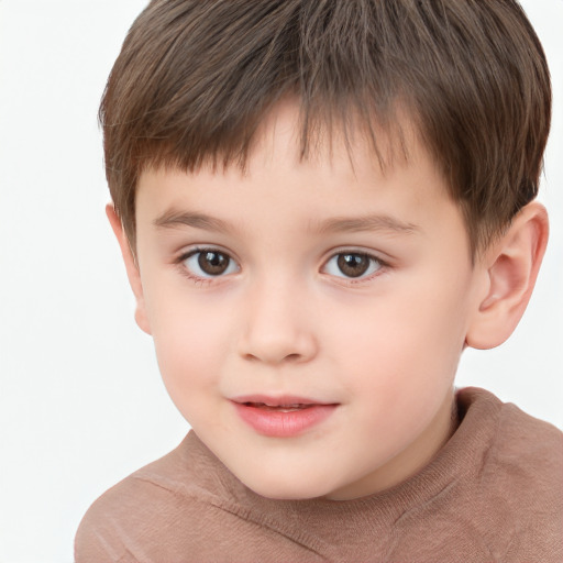 Joyful white child male with short  brown hair and brown eyes