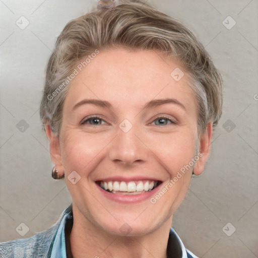 Joyful white adult female with short  brown hair and grey eyes