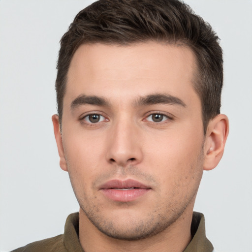 Neutral white young-adult male with short  brown hair and brown eyes