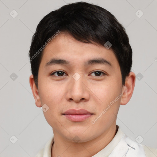 Joyful asian young-adult male with short  brown hair and brown eyes