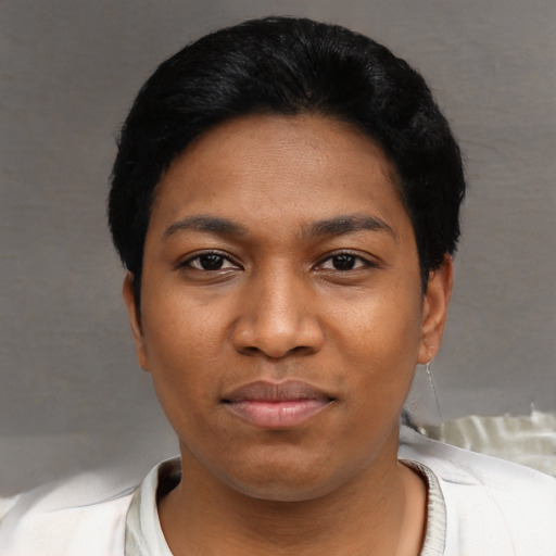 Joyful asian young-adult female with short  black hair and brown eyes