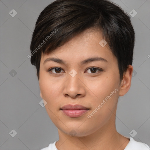 Joyful asian young-adult female with short  brown hair and brown eyes