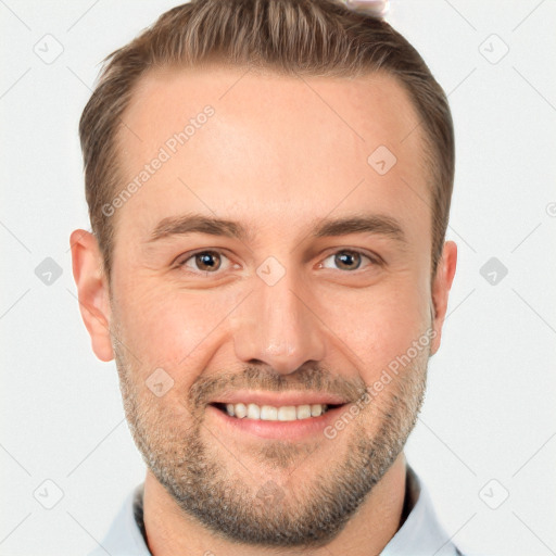 Joyful white adult male with short  brown hair and brown eyes