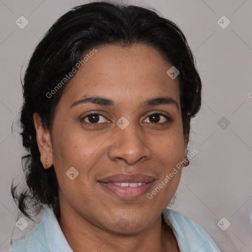 Joyful asian adult female with medium  brown hair and brown eyes