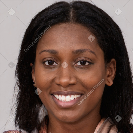 Joyful black young-adult female with medium  brown hair and brown eyes