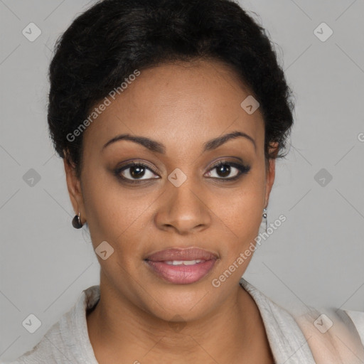 Joyful black young-adult female with short  brown hair and brown eyes