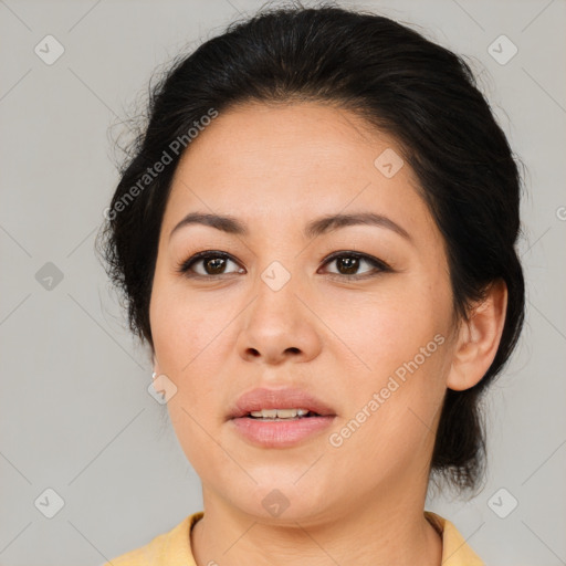 Joyful white adult female with medium  brown hair and brown eyes