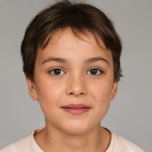 Joyful white child female with short  brown hair and brown eyes