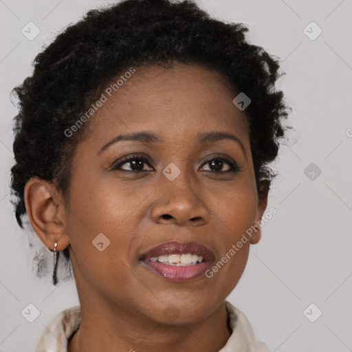 Joyful black young-adult female with short  brown hair and brown eyes