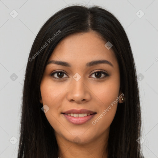 Joyful latino young-adult female with long  brown hair and brown eyes