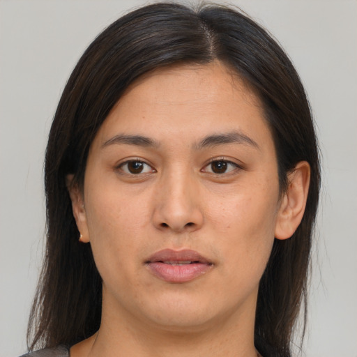 Neutral asian young-adult female with medium  brown hair and brown eyes