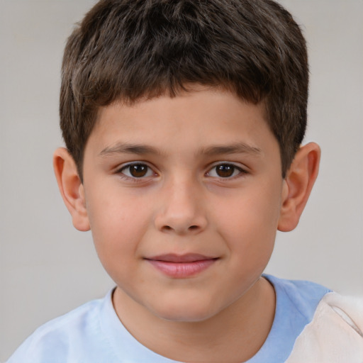 Joyful white child male with short  brown hair and brown eyes