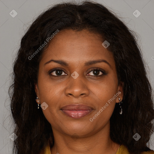 Joyful black young-adult female with long  brown hair and brown eyes