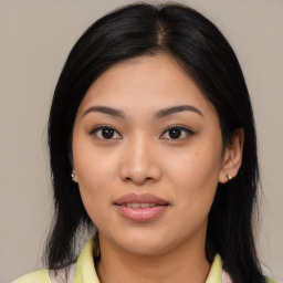 Joyful asian young-adult female with medium  black hair and brown eyes