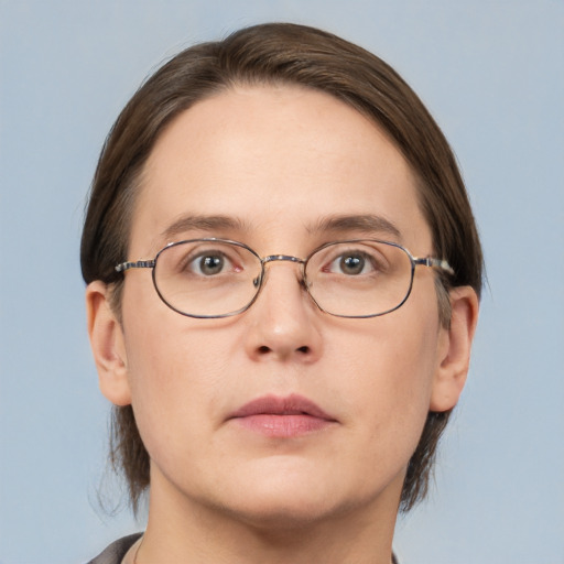 Neutral white adult female with short  brown hair and brown eyes