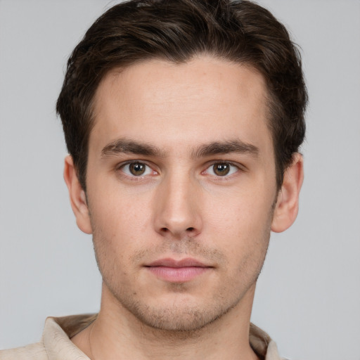 Neutral white young-adult male with short  brown hair and brown eyes