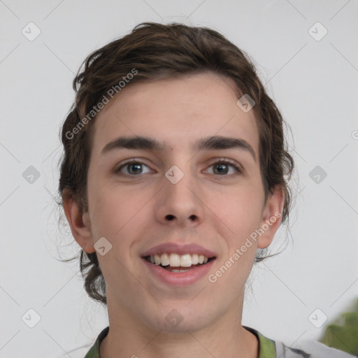 Joyful white young-adult male with medium  brown hair and brown eyes