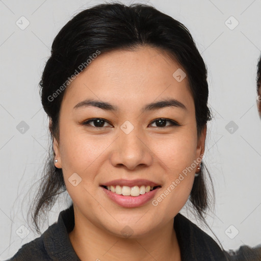 Joyful asian young-adult female with medium  brown hair and brown eyes