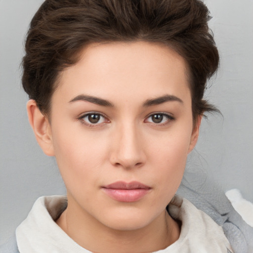 Neutral white young-adult female with short  brown hair and brown eyes