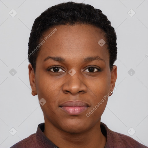 Joyful black young-adult female with short  black hair and brown eyes