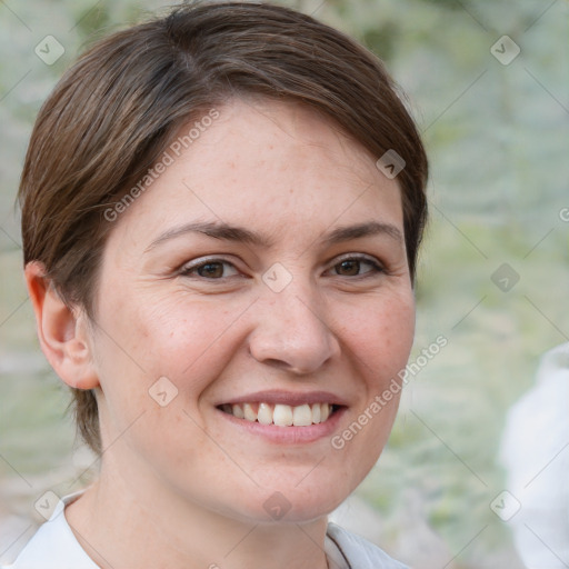 Joyful white adult female with short  brown hair and brown eyes