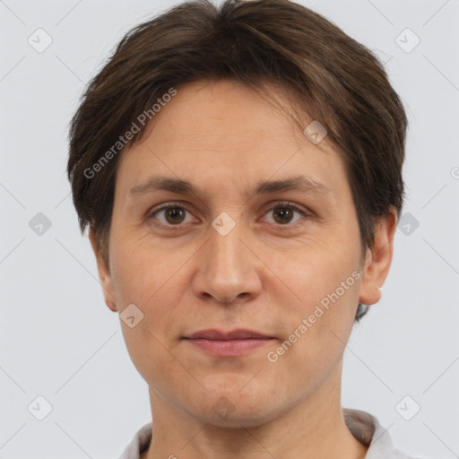 Joyful white adult female with short  brown hair and brown eyes