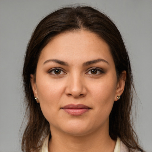 Joyful white young-adult female with medium  brown hair and brown eyes
