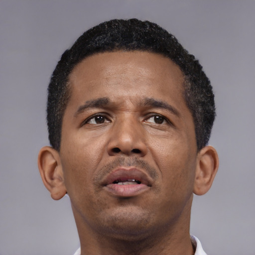 Neutral latino adult male with short  black hair and brown eyes
