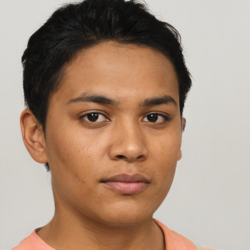 Neutral latino young-adult male with short  brown hair and brown eyes