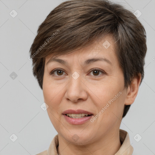 Joyful white adult female with short  brown hair and brown eyes