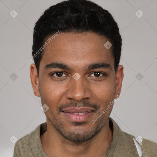 Joyful black young-adult male with short  black hair and brown eyes