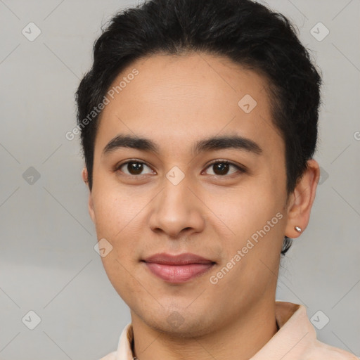 Joyful latino young-adult male with short  black hair and brown eyes