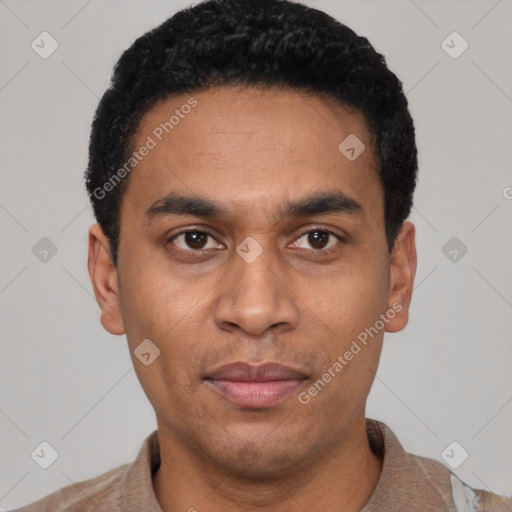 Joyful latino adult male with short  black hair and brown eyes