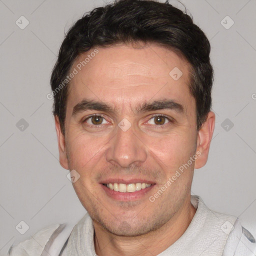 Joyful white young-adult male with short  black hair and brown eyes