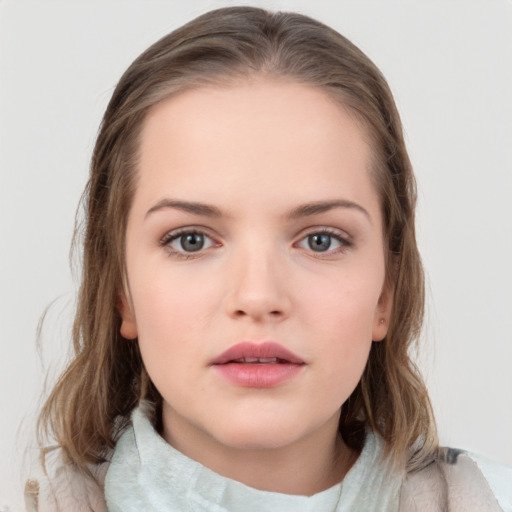 Neutral white child female with medium  brown hair and grey eyes