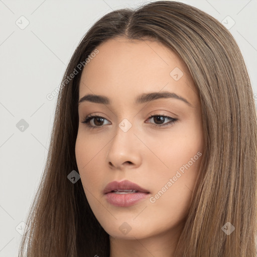 Neutral white young-adult female with long  brown hair and brown eyes