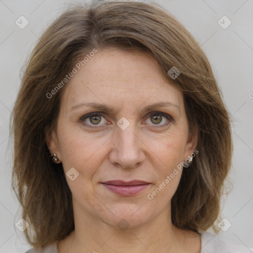 Joyful white adult female with medium  brown hair and grey eyes