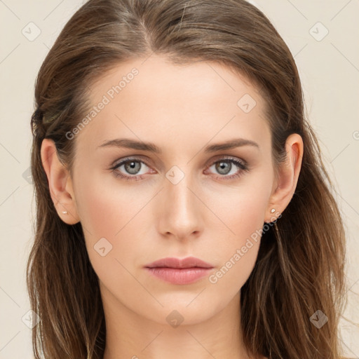 Neutral white young-adult female with long  brown hair and brown eyes