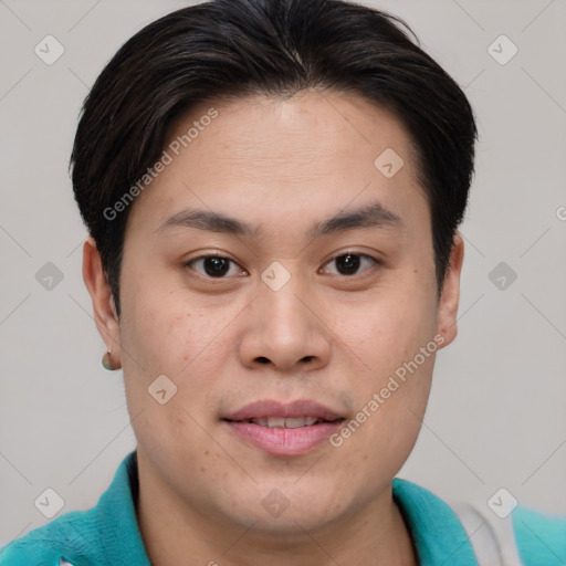 Joyful asian young-adult male with short  brown hair and brown eyes