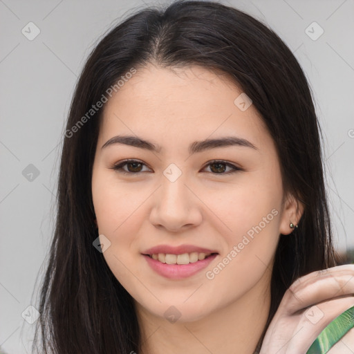 Joyful white young-adult female with long  brown hair and brown eyes