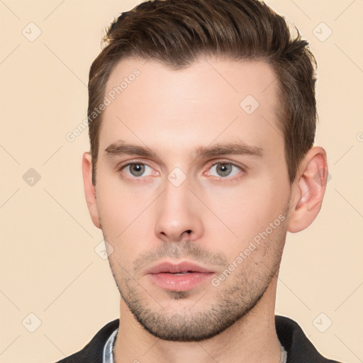 Neutral white young-adult male with short  brown hair and brown eyes