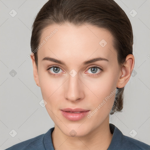 Neutral white young-adult female with medium  brown hair and grey eyes