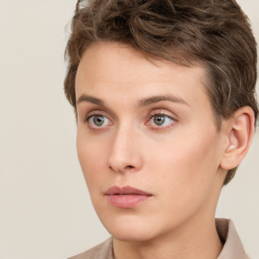 Neutral white young-adult female with short  brown hair and brown eyes