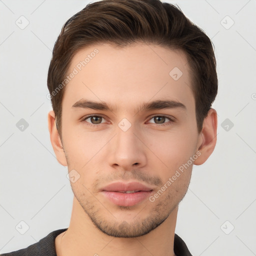 Neutral white young-adult male with short  brown hair and brown eyes