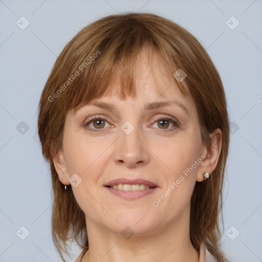 Joyful white adult female with medium  brown hair and grey eyes