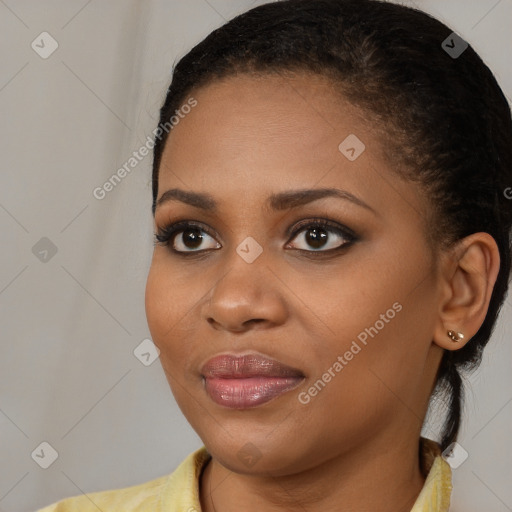 Joyful black young-adult female with medium  brown hair and brown eyes