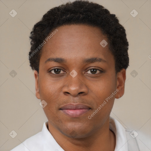 Joyful black young-adult male with short  brown hair and brown eyes