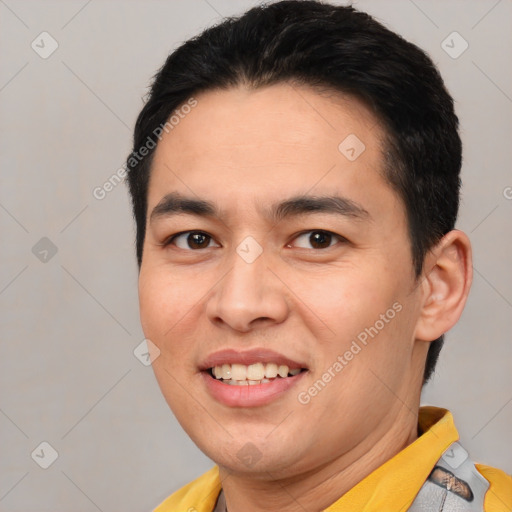 Joyful white young-adult male with short  black hair and brown eyes